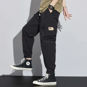 Elasticity Multi-Pocket Zipper Tapered Pants